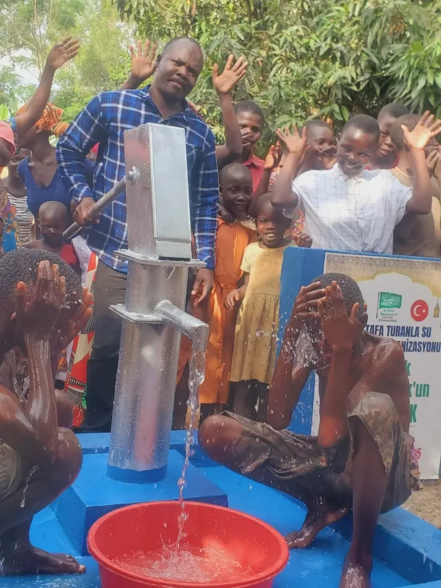 Community members at borehole commissioning